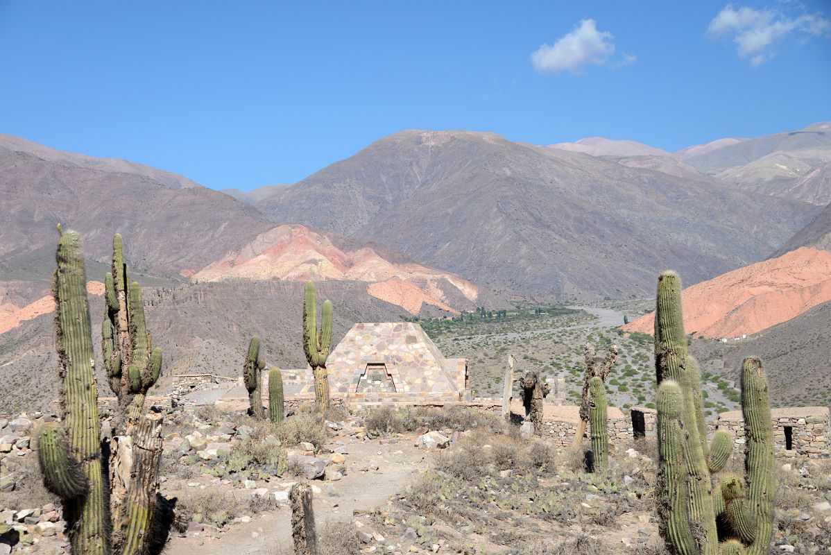 14 Archaeologists Monument With Colourful Hill Beyond At Pucara de Tilcara In Quebrada De Humahuaca
